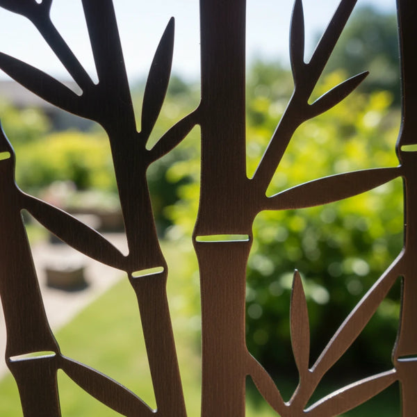 Close-up of Antique Bronze PVD finish and clean laser-cut edges.