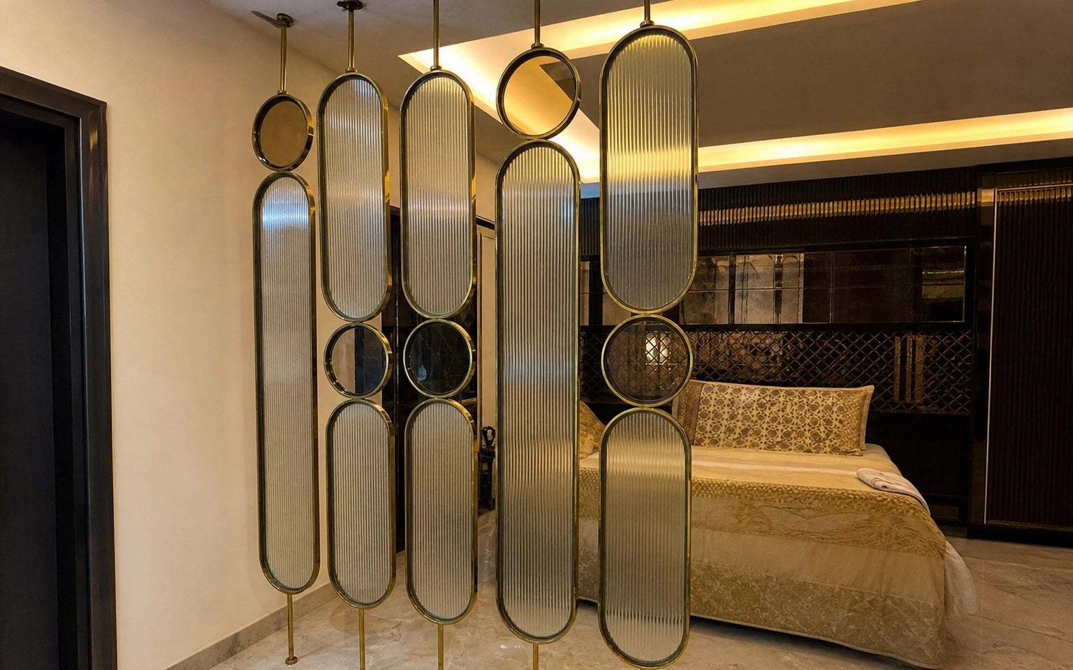 Brass framed fluted glass ring partition screens dividing a luxury bedroom suite — visualization