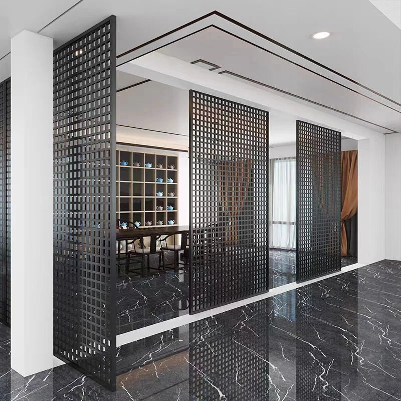 Brushed stainless steel feature panel installed in a hotel lobby reception wall