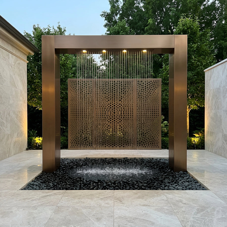Bronze PVD portal water feature with a rain curtain and a perforated bronze screen wall in a marble courtyard — visualization