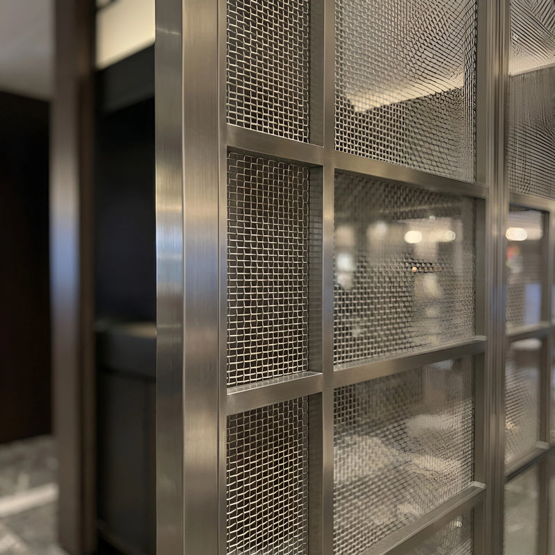 Our linear grid laser-cut screen direction for open-plan commercial and hospitality spaces.