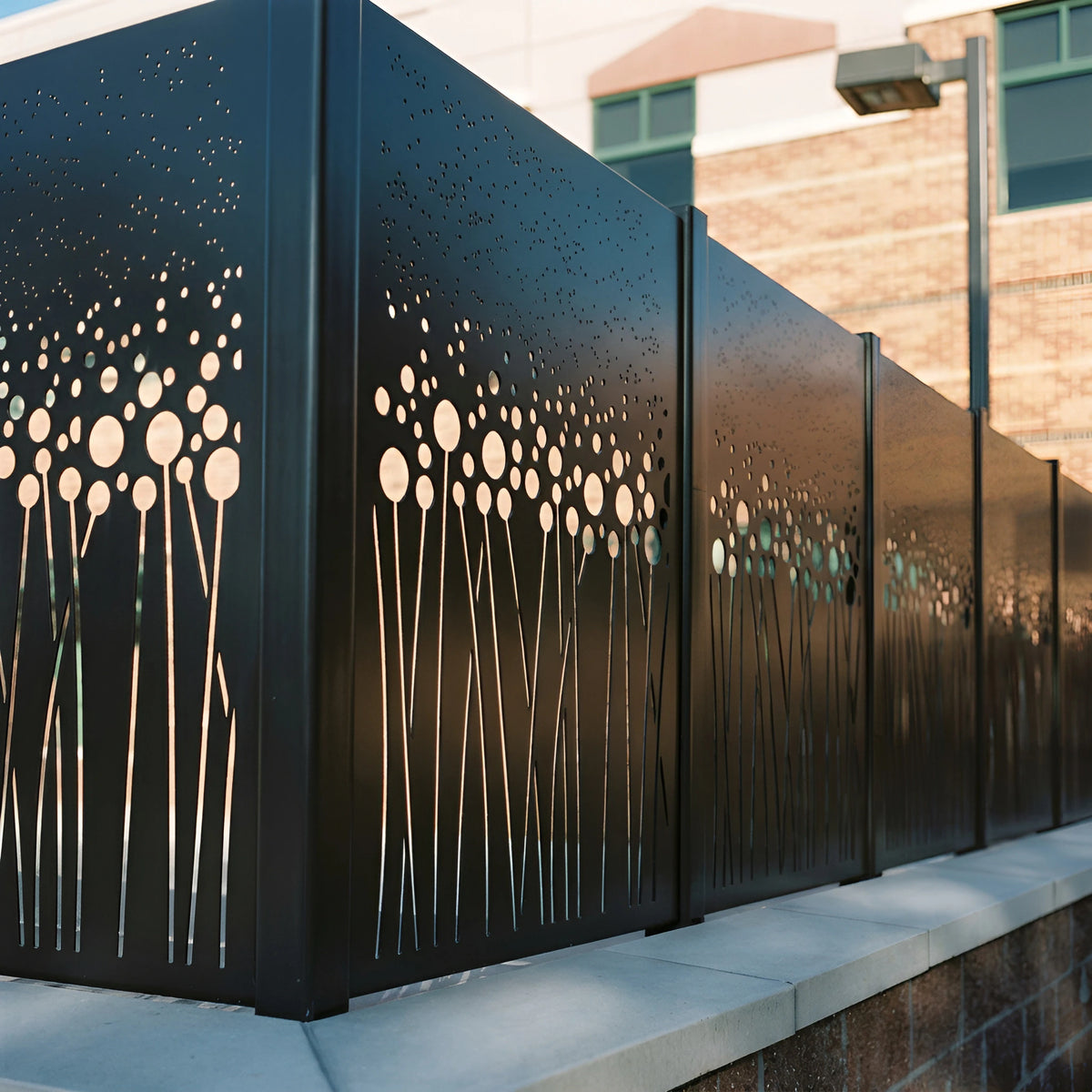 Antique bronze outdoor privacy screen creating full enclosure in a luxury garden patio.